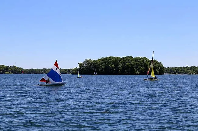 Sailboats on Lake Angelus on a sunny day